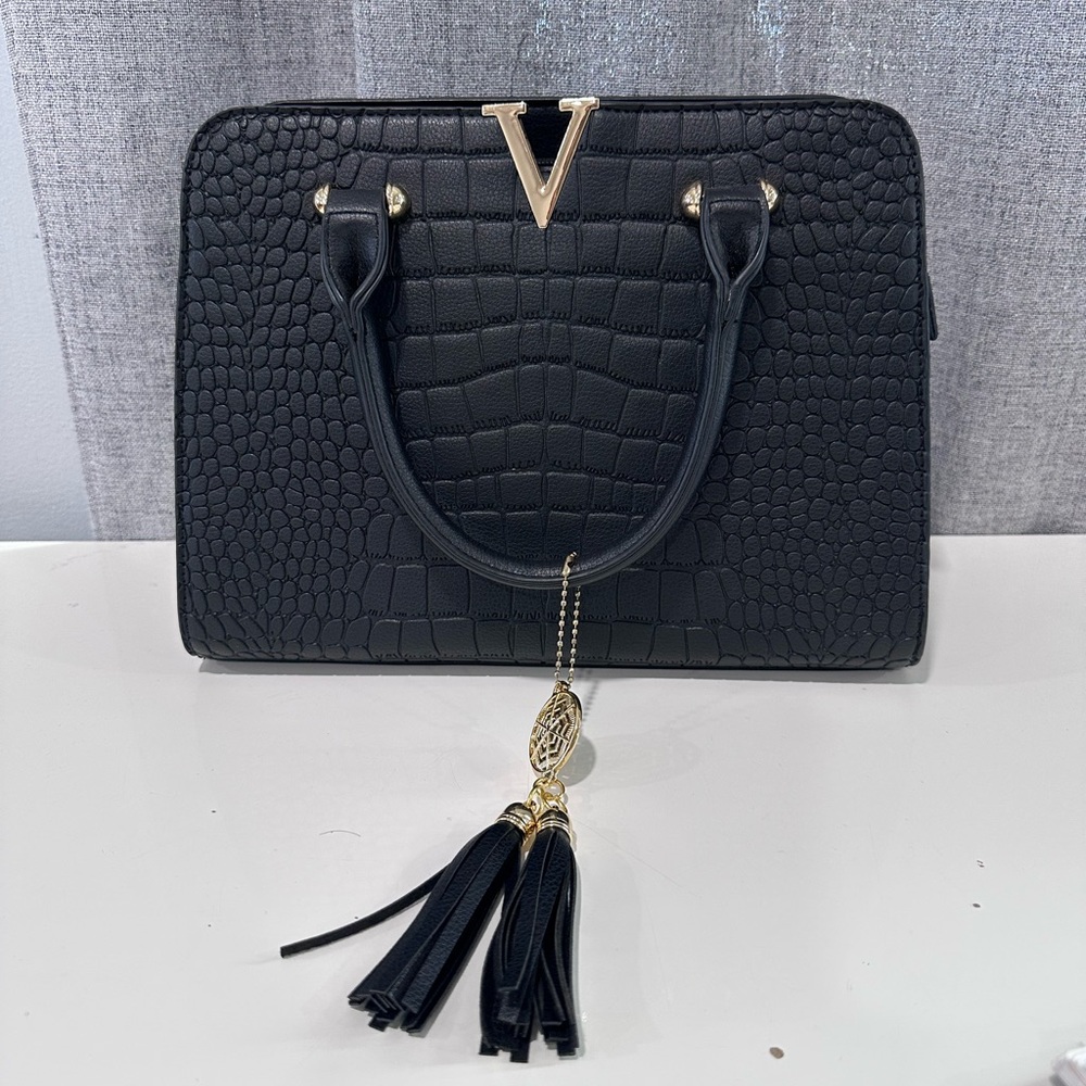 Crossi New York black faux leather bag. NWOT.
